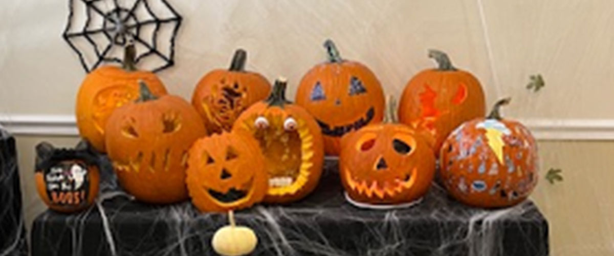 Assorted carve pumpkins from Cottrell Title's pumpkin carving contest